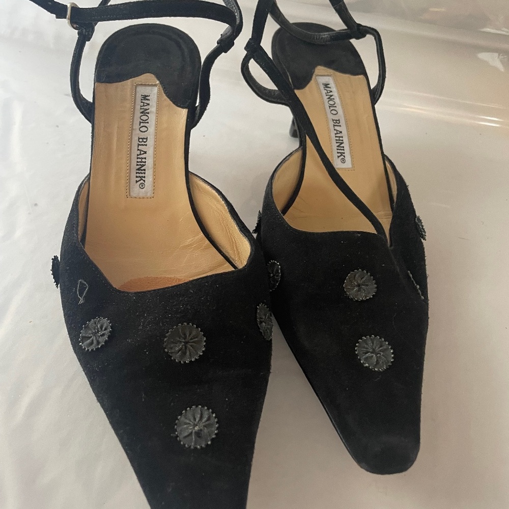 Low heeled black suede strap evening heels.